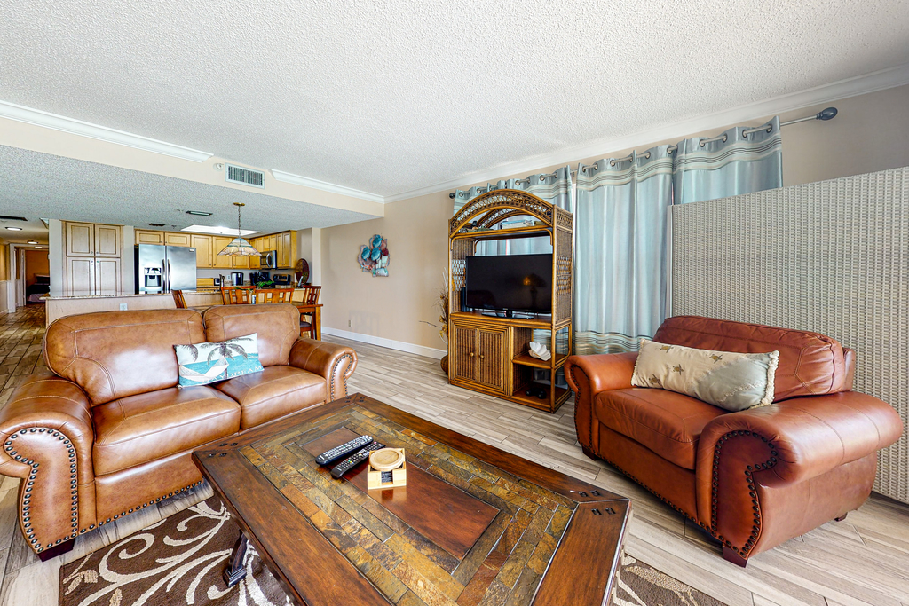 Beachfront condo with heated pool hot tub balcony and grill