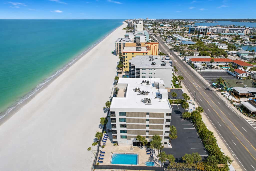 Extraordinary Gulf front condo w screened in balcony WD AC heated pool pool spa