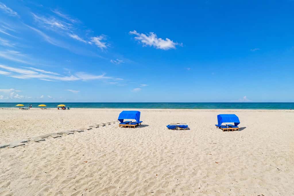 Extraordinary Gulf front condo w screened in balcony WD AC heated pool pool spa