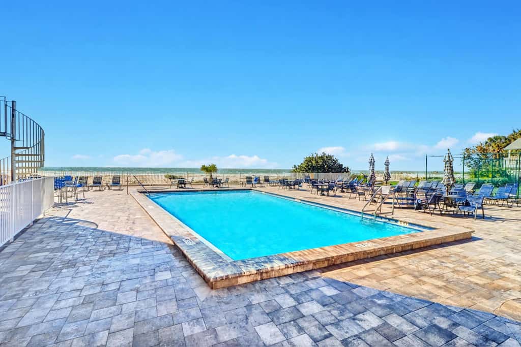 Dog friendly beachfront condo with pool hot tub tennis and AC snowbird friendly