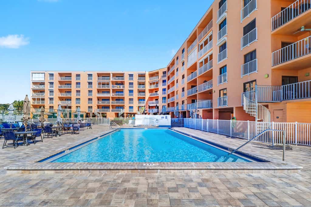 Dog friendly beachfront condo with pool hot tub tennis and AC snowbird friendly