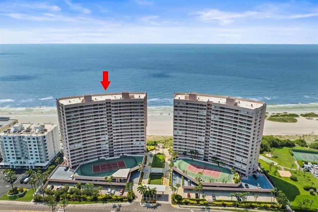 12th floor beachfront condo with balcony heated pool gym pool spa and tennis
