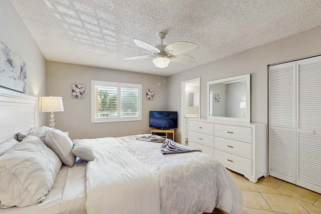 Waterfront condo with updated amenities heated pool hot tub and tennis