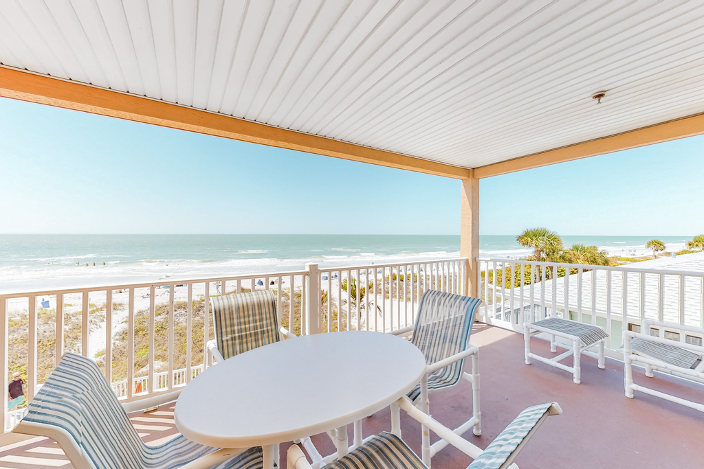 Beautiful oceanfront condo on the beach with pool and WiFi walk to restaurants