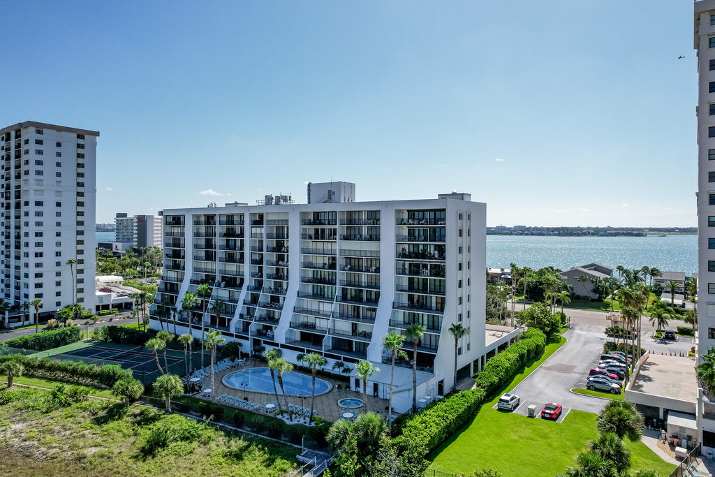 Second floor condo with pool and tennis court private WD and central AC