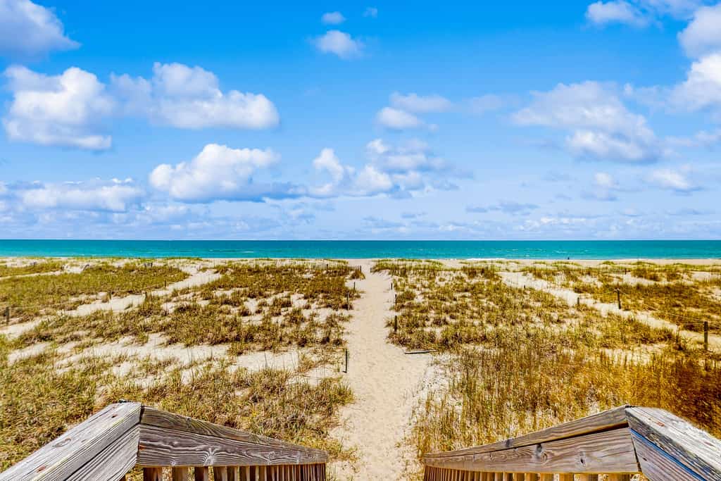 Oceanfront duplex with lovely interior, large deck, hot tub, AC & W/D