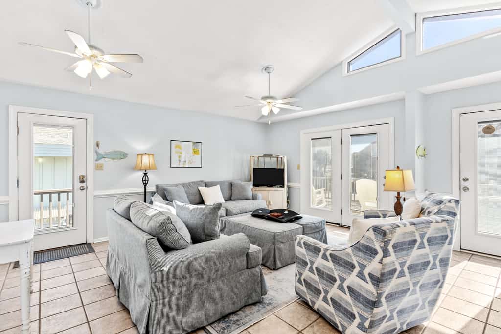 Large and roomy house across from the beach with WiFi, W/D, central AC, and deck