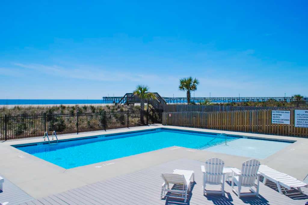Lower Waterfront Condo with Oceanfront Balcony, Shared Outdoor Pool, WiFi & AC