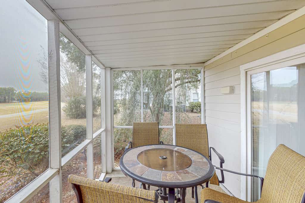 STJ22A: Coastal Condo with golf course view and shared pool access