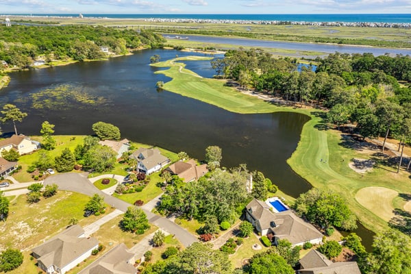 Shining Waters: Gorgeous waterfront home with private hot tub, pool, views, deck, & fireplace