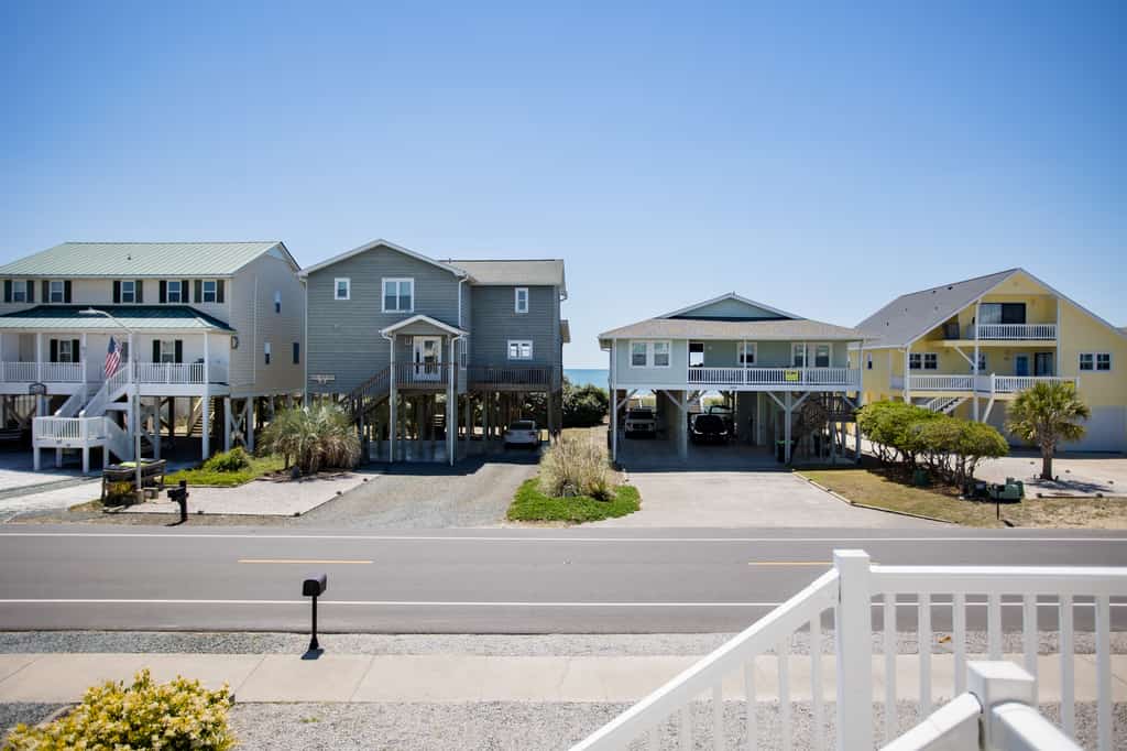 Designer, second-row home with elevator, marsh views, 2 living rooms & W/D