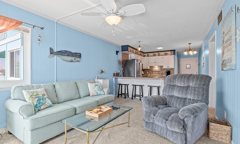 Ocean-view condo with beach access, WiFi, pool, washer/dryer, & AC