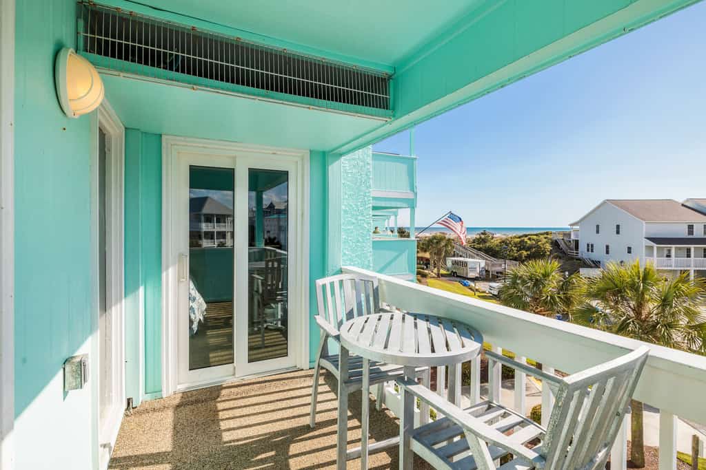 Ocean-view condo with beach access, WiFi, pool, washer/dryer, & AC