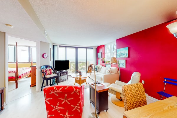 Inviting ocean view condo with balcony, pool, tennis, central AC, & W/D