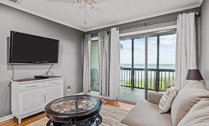 Modern waterfront gem with pools, direct beach access, WiFi & balcony