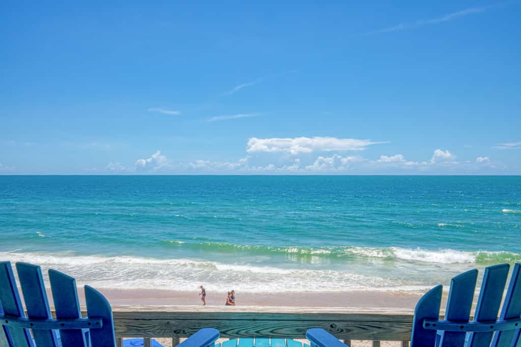 Oceanfront condo with beach views, private beach access, community pool, gazebo