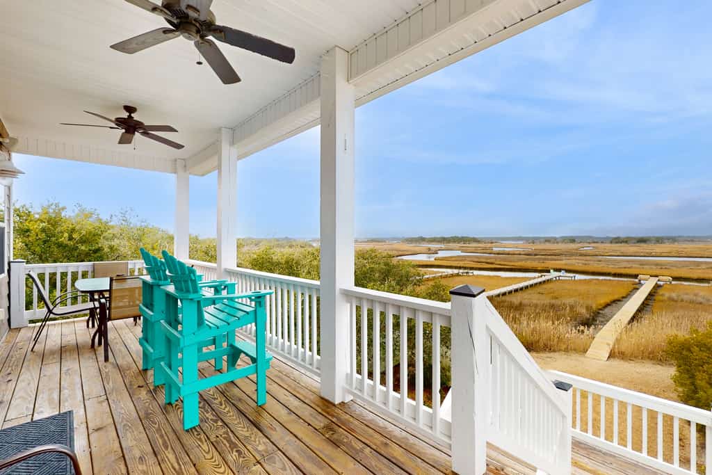 Dog-friendly sound-front home with private dock, beach access, deck, grill, W/D