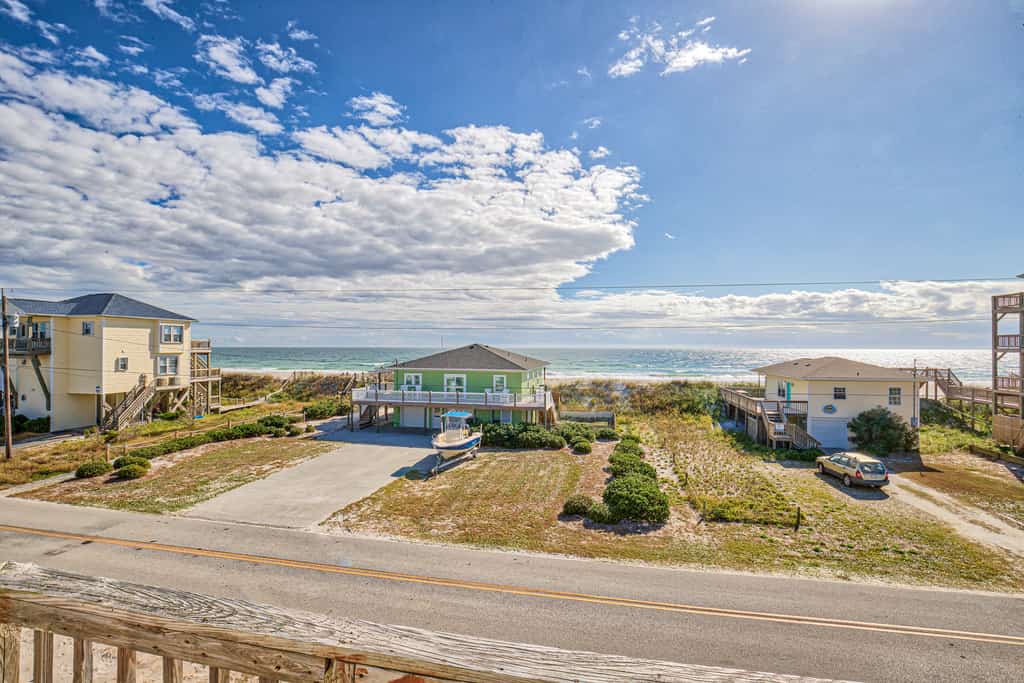 Dog-friendly home with ocean views, beach access, washer/dryer & central AC