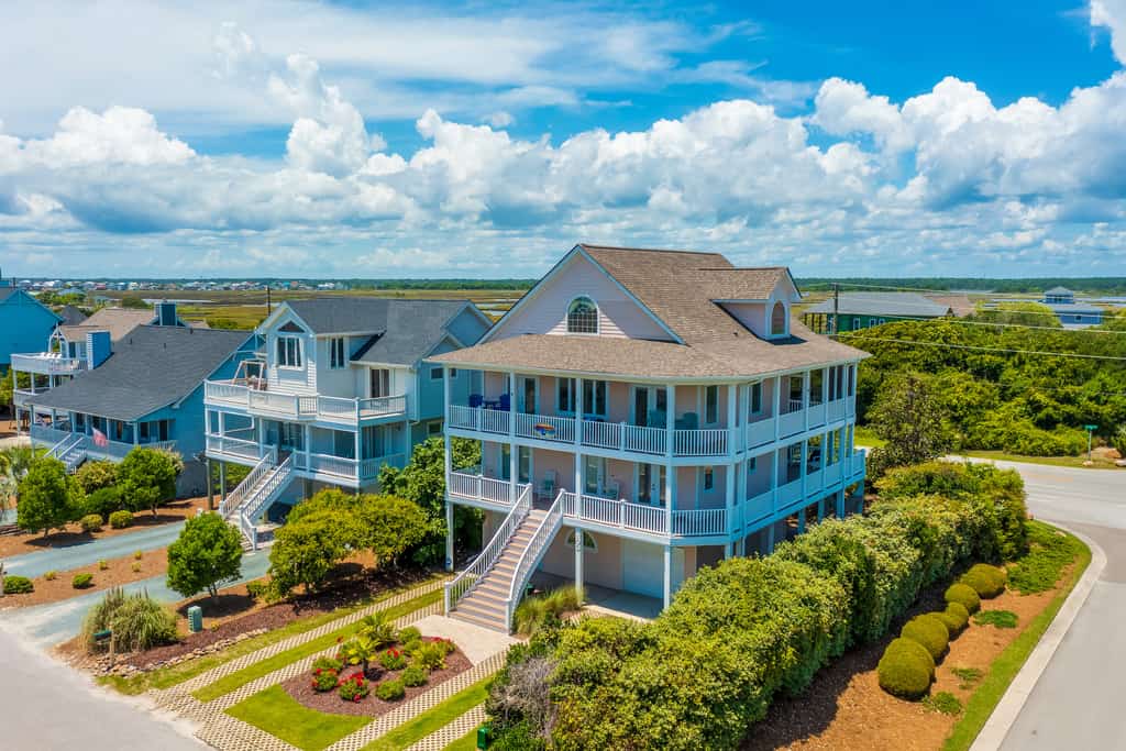 2nd-row ocean-view home with elevator, cmty pool & tennis