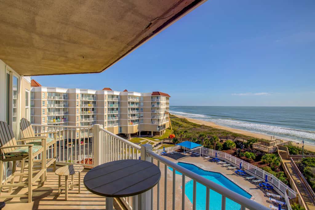 Oceanfront St. Regis condo with ocean & pool views, gym & beach access