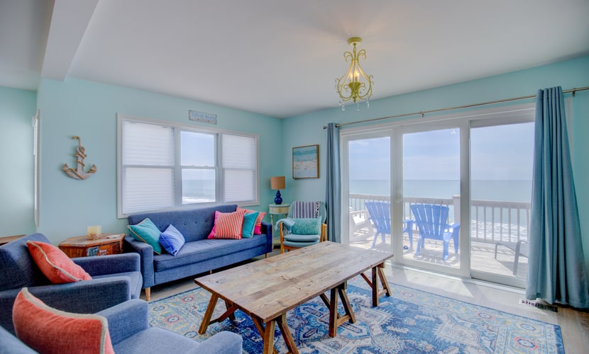 Dog-friendly duplex with ocean views, beach access, washer/dryer, central AC