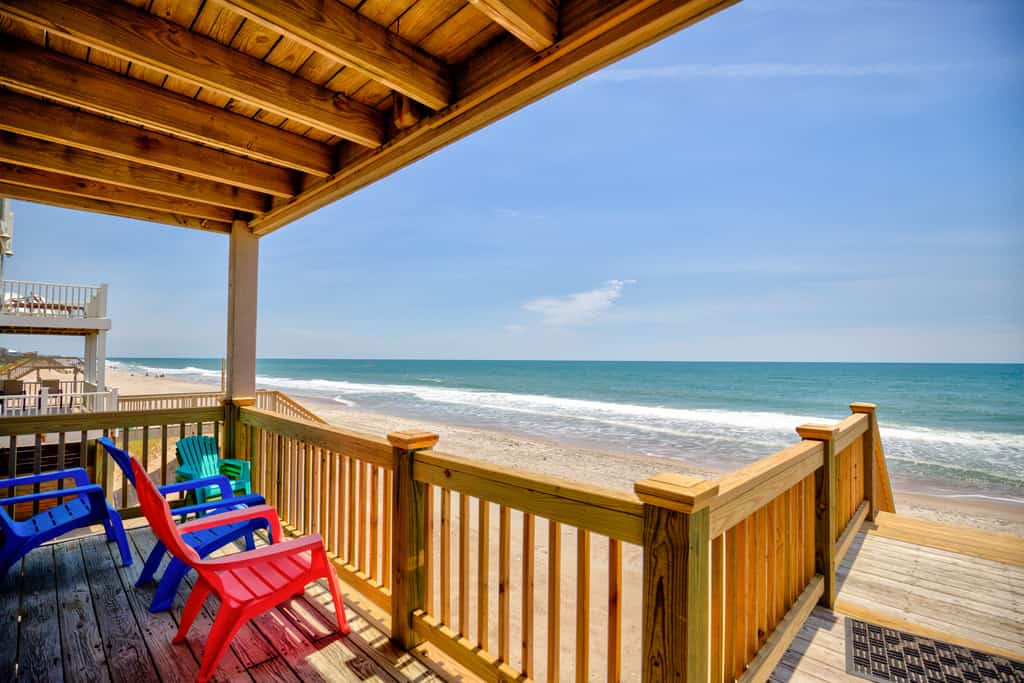 Dog-friendly duplex with ocean views, beach access, washer/dryer, central AC