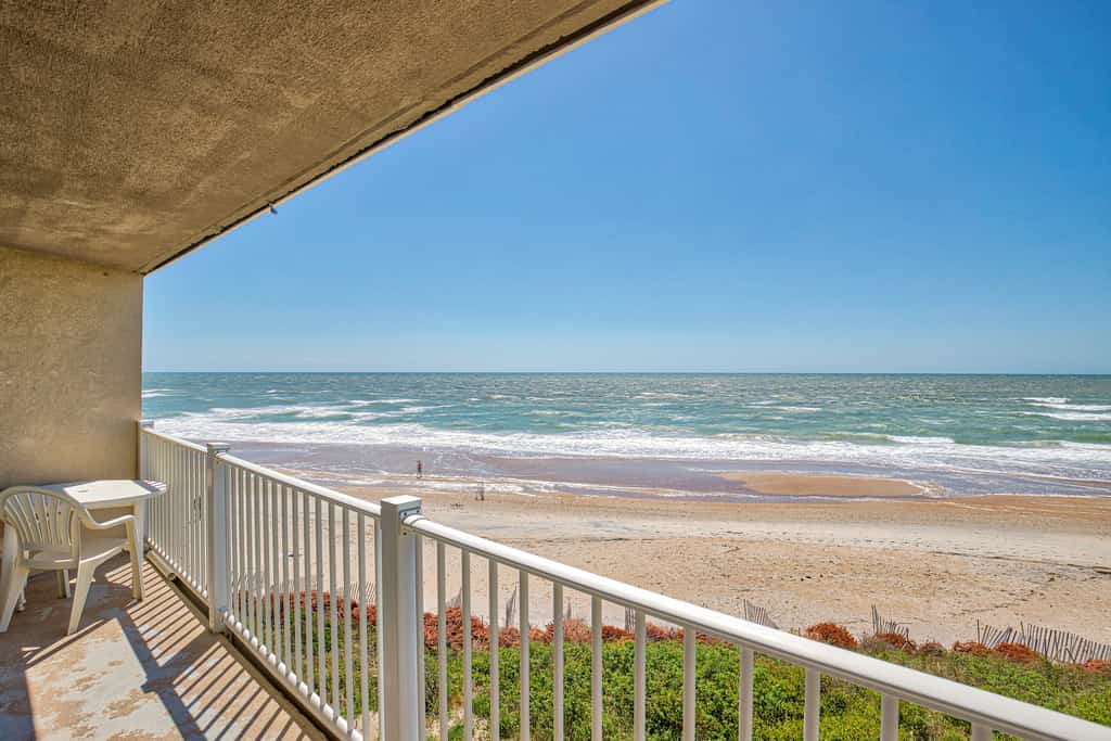 Oceanfront St. Regis condo with resort pool, gym, arcade & beach access