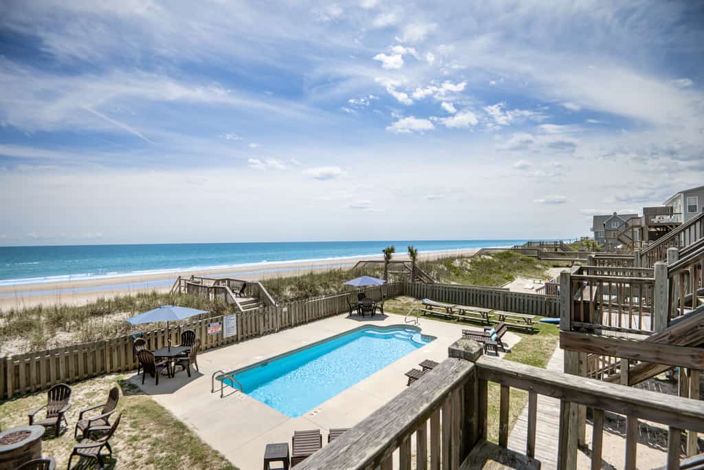 Moonshine - Oceanfront townhome with beach access, a pool, hot tub, W/D & AC