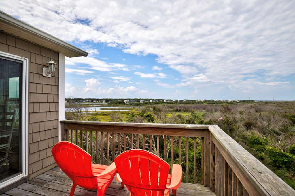 Water-view duplex with decks, outdoor shower, washer/dryer, and beach access
