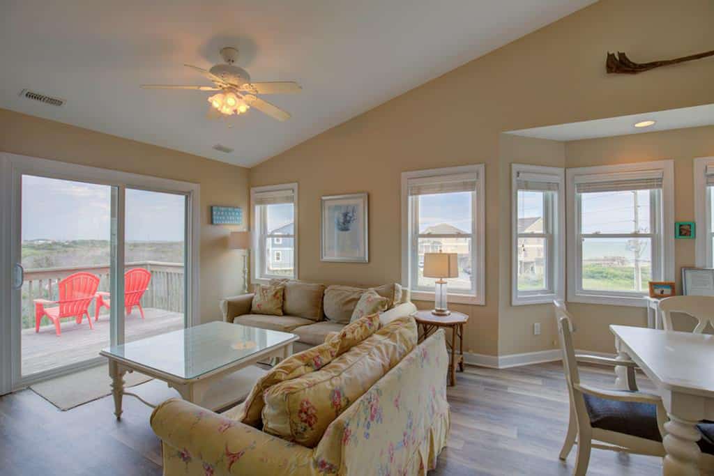 Water-view duplex with decks, outdoor shower, washer/dryer, and beach access