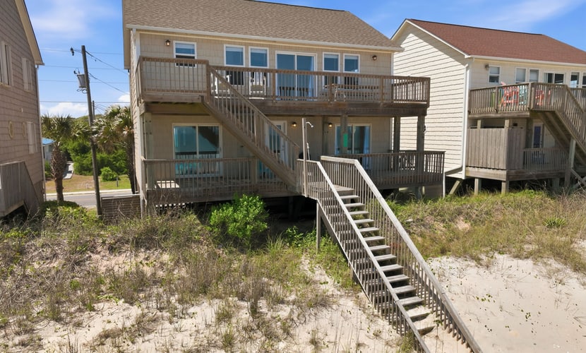 Beachfront home with ocean views, private beach access, elevator, & jetted tub