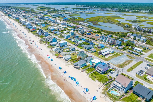 Sound front duplex with enclosed yard, gazebo, dock and ultimate sunset views!