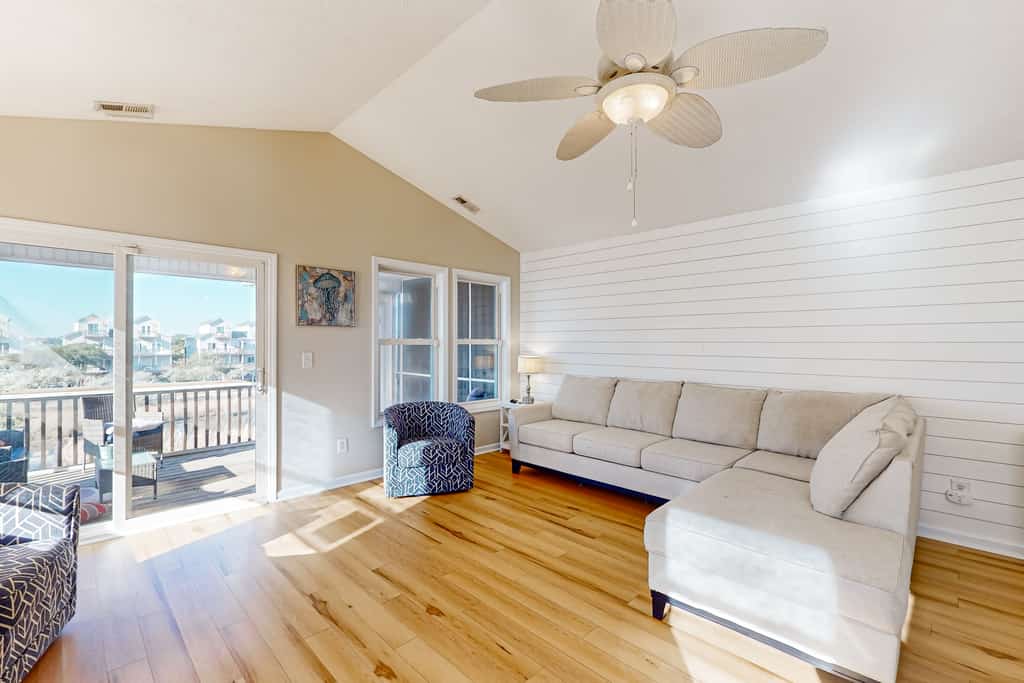 Sound front duplex with enclosed yard, gazebo, dock and ultimate sunset views!