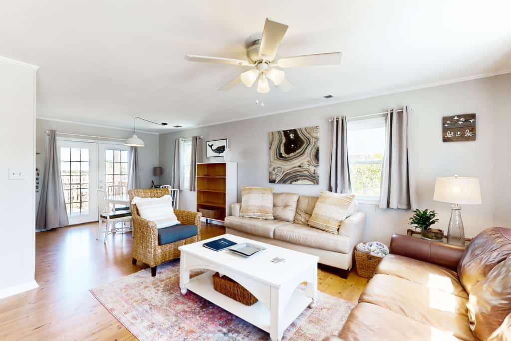 Dog-friendly house with enclosed yard, deck space and short walk to beach
