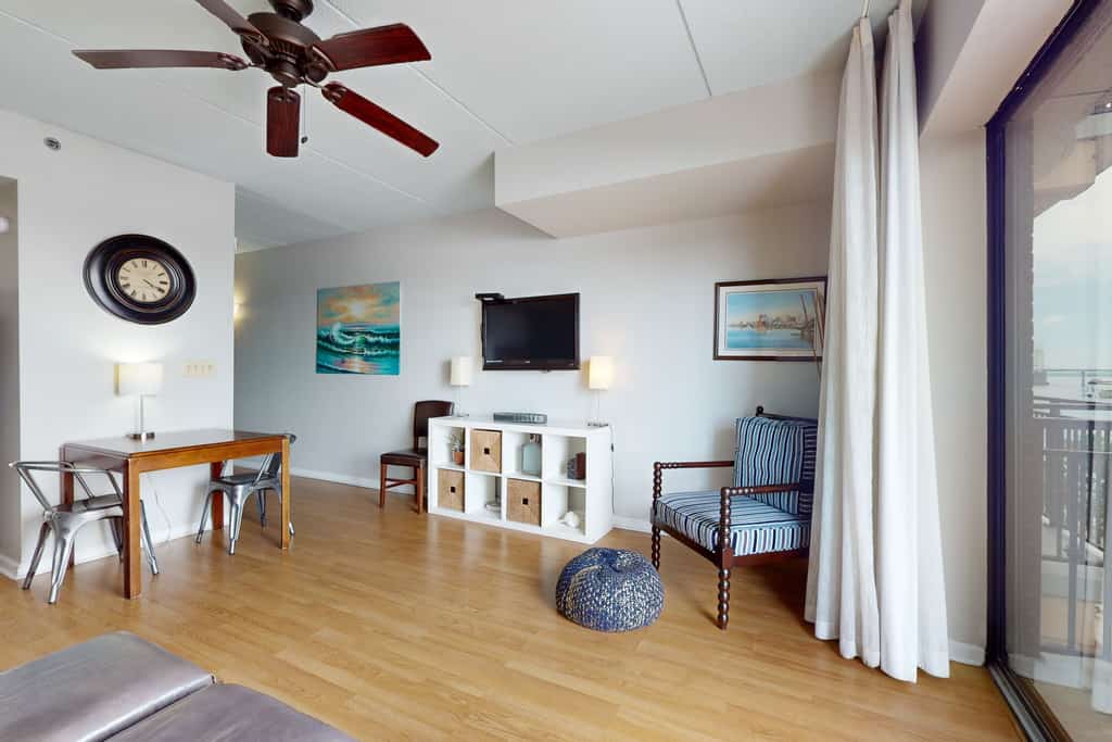 2 historic district condos with river-view balconies & highly walkable locale