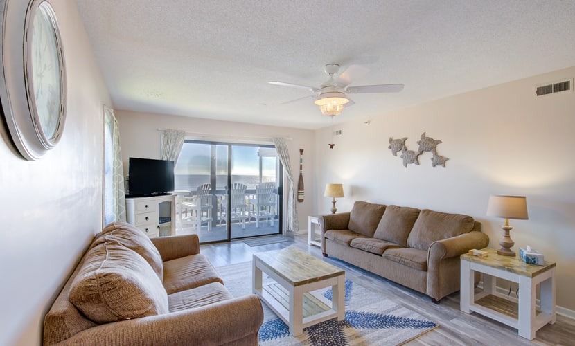 Oceanfront condo with elevator, private beach, ocean view, community pool, grill