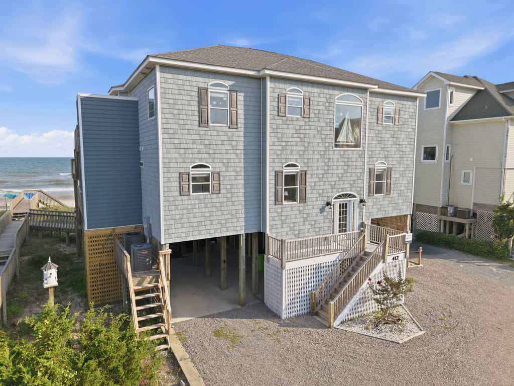 Oceanfront home with direct beach access, community pool & private hot tub