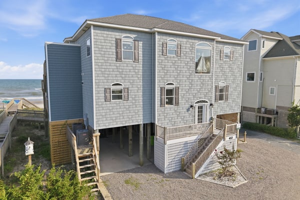 Oceanfront home with direct beach access, community pool & private hot tub