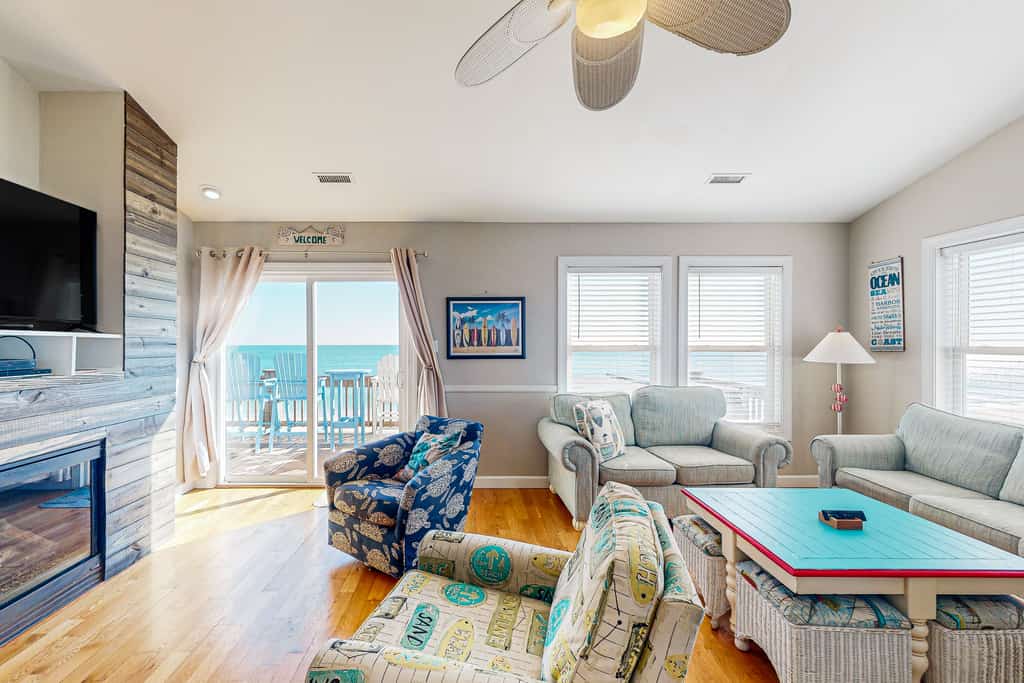 Oceanfront, dog-friendly home with private hot tub and endless beach views!
