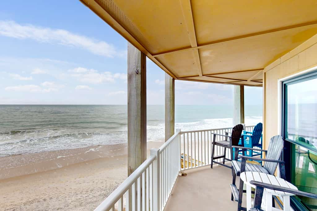 Beachfront condo with ocean views, large balcony, washer/dryer, pool & tennis