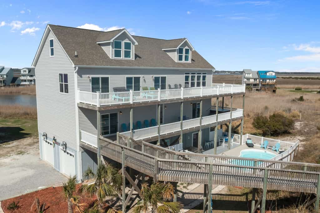 Serene oceanfront home with private pool and hot tub with inlet views and beach