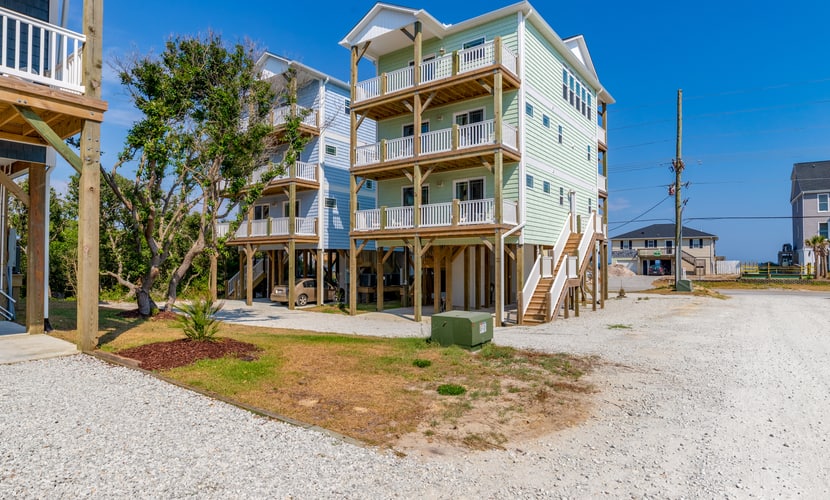 Spacious second-row retreat with ocean views and elevator, only steps from beach access in Surf City