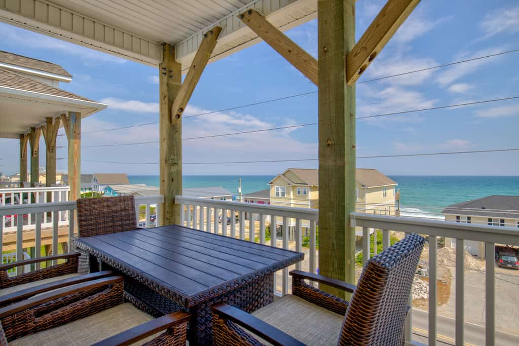 Spacious second-row retreat with ocean views and elevator, only steps from beach access in Surf City