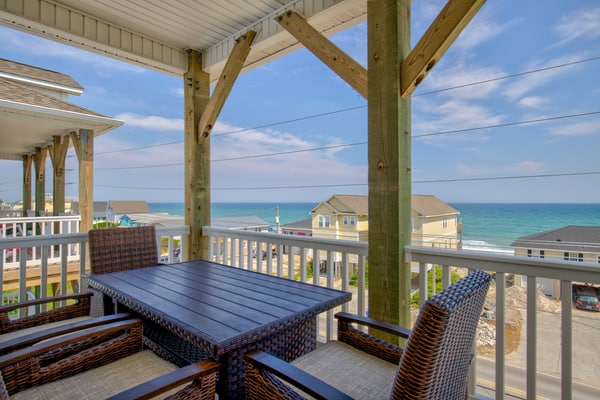 Spacious second-row retreat with ocean views and elevator, only steps from beach access in Surf City