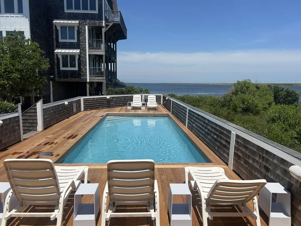 Waterfront house with private hot tub, pool, sound view, & AC - walk to dining