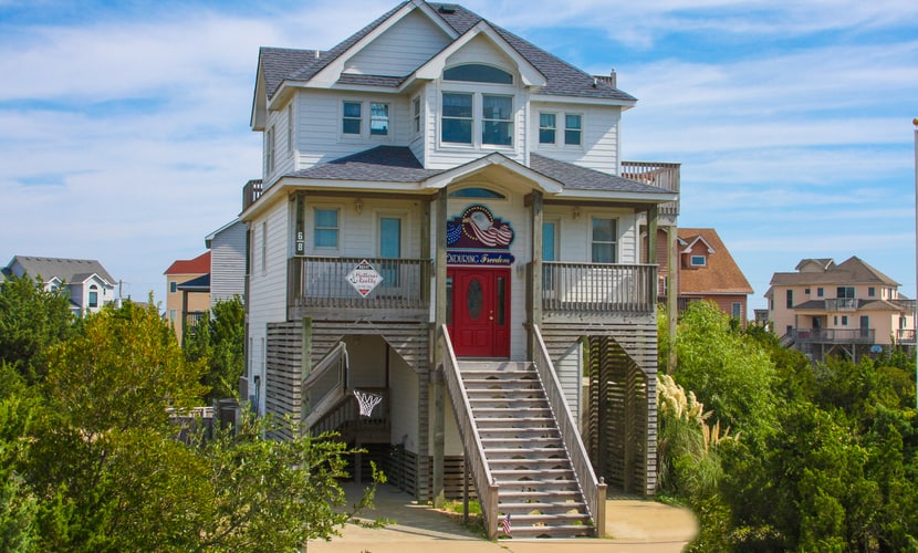 Dog-friendly home with private pool, hot tub, foosball, & AC - walk to beach