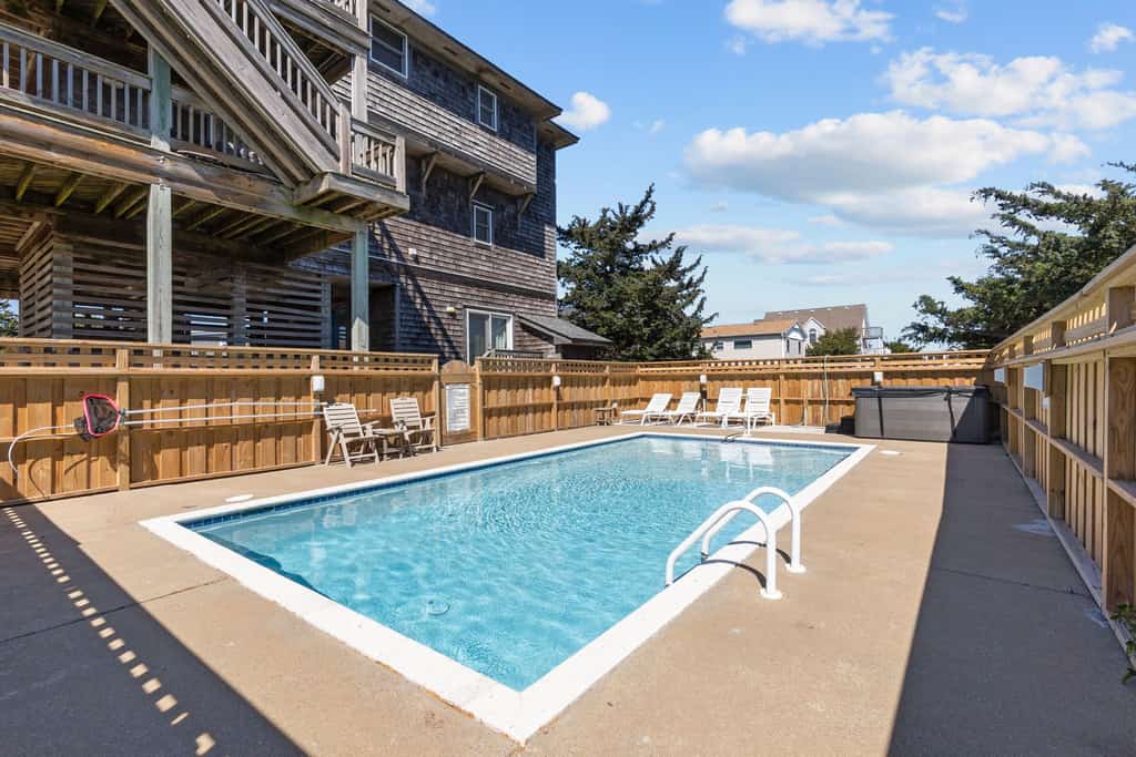 Oceanside home with private saltwater pool, hot tub, game room, & fireplace