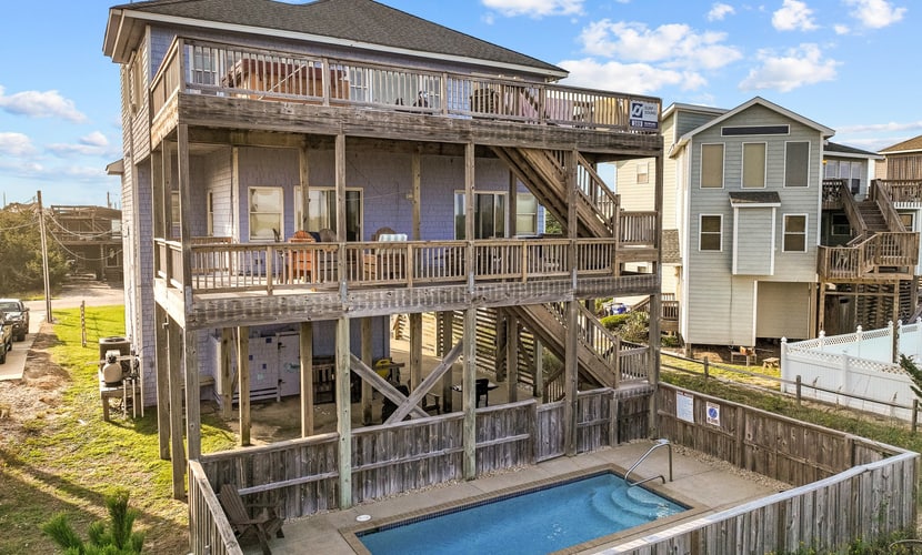 Coastal home with private pool, game room, media lounge, oceanside deck