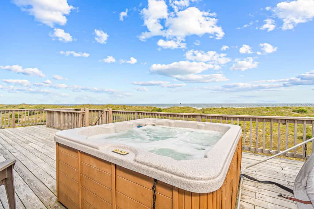 Coastal home with private pool, game room, media lounge, oceanside deck
