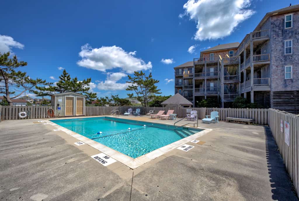 Bright, updated oceanfront home with shared pool, private deck, & great views